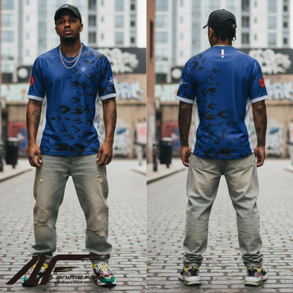 Man wearing a Naruto Anime Jersey with black patterns, standing on a street.